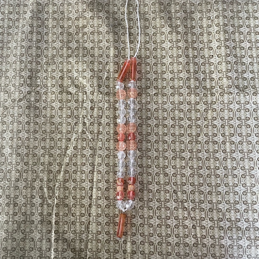 This is a orange necklace